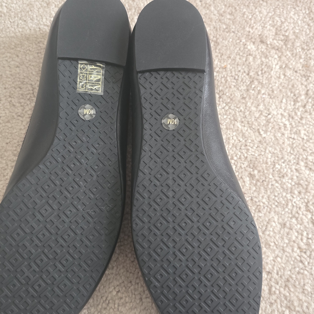Tory Burch Black Flats with Silver Logo - Picture 3 of 7